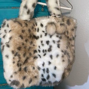 PB teen fluffy cheetah overnight bag
